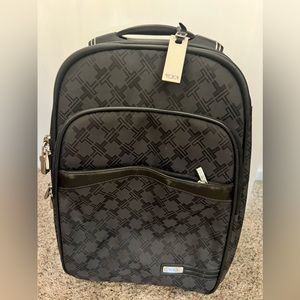 TUMI carry in roller suitcase - luggage